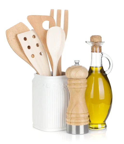 Kitchen utensils in holder and condiments — Stock Photo, Image