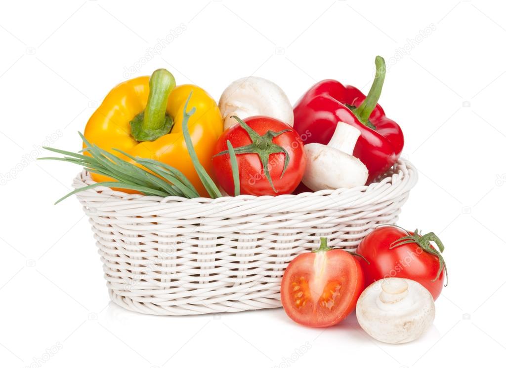 Fresh vegetables and mushrooms in basket