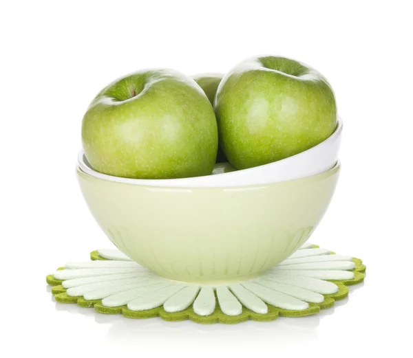 Green apples in fruit bowl — Stock Photo, Image