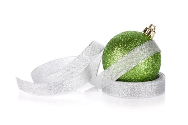 Green sparkling christmas bauble with ribbon — Stock Photo, Image