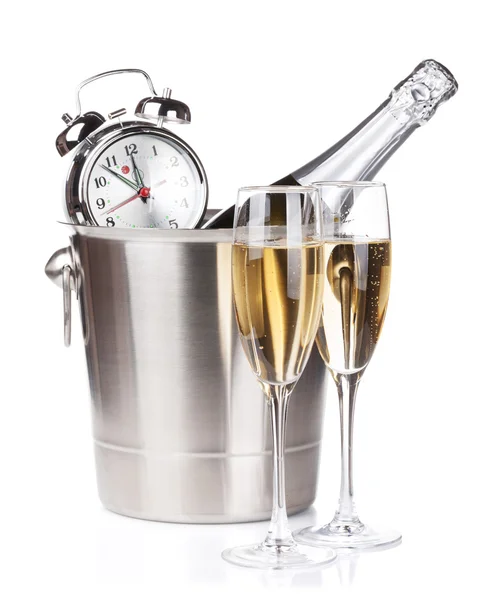 Champagne bottle, two glasses and alarm clock — Stock Photo, Image