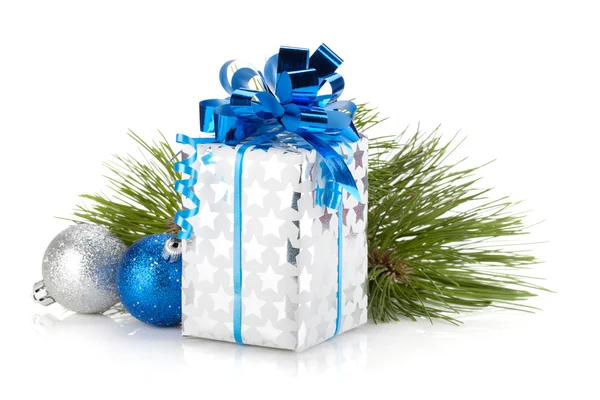 Christmas gift box and baubles — Stock Photo, Image