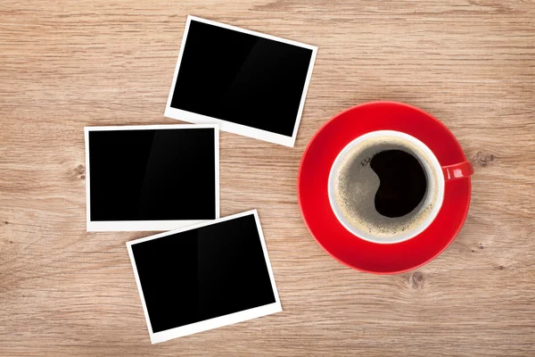 Cup of coffee and three photo frames — Stock Photo, Image