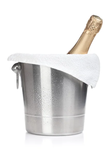 Champagne bottle in ice bucket — Stock Photo, Image