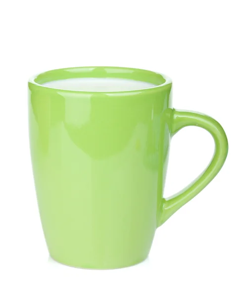 Taza verde de leche — Foto de Stock
