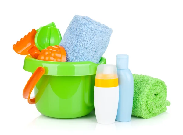 Beach baby toys, towels and bottles — Stock Photo, Image