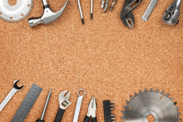 Set of tools on cork background — Stock Photo, Image