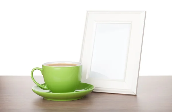 Photo frame and coffee cup — Stock Photo, Image