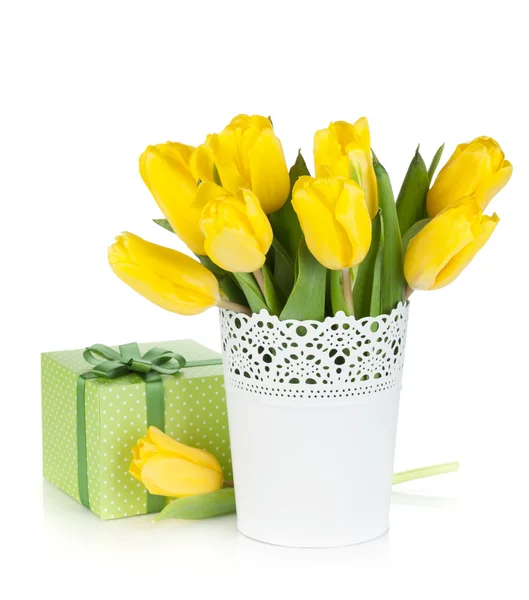 Yellow tulips in a vase and gift box — Stock Photo, Image