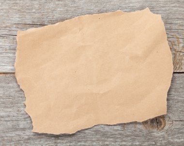 eski kağıt parçası üzerinde ahşap dokulu arka plan