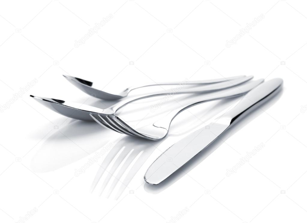 Silverware or flatware set of fork, spoons and knife