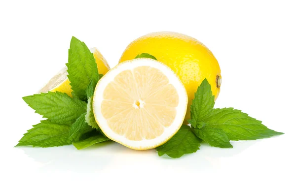 Tre limoni maturi e menta — Foto Stock