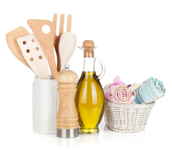 Kitchen utensils in holder and condiments — Stock Photo, Image