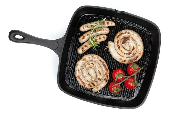 Grilled sausages on frying pan — Stock Photo, Image