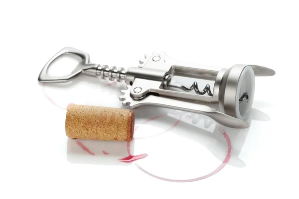 Cork and corkscrew with red wine stains — Stock Photo, Image