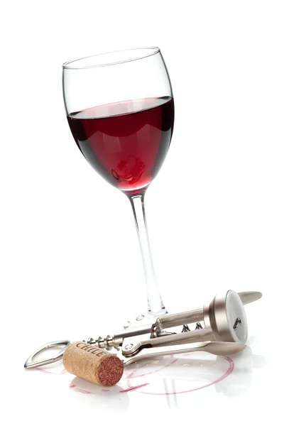 Red wine glass, cork and corkscrew — Stock Photo, Image