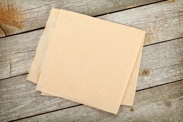 Cozinhar papel sobre mesa de madeira — Fotografia de Stock