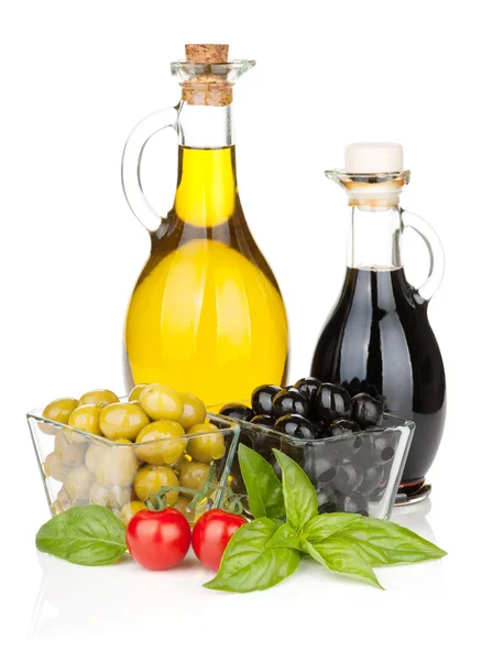 Olives, tomatoes, herbs and condiments — Stock Photo, Image