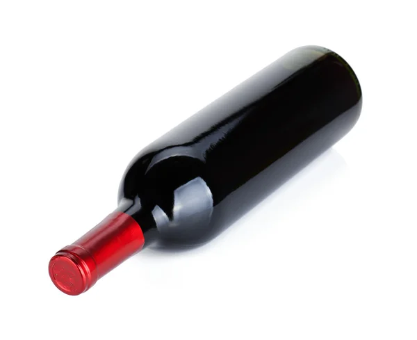Leží láhev červeného vína — Stock fotografie