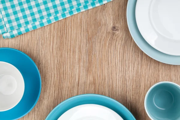 Kitchen utensils over wooden table — Stock Photo, Image