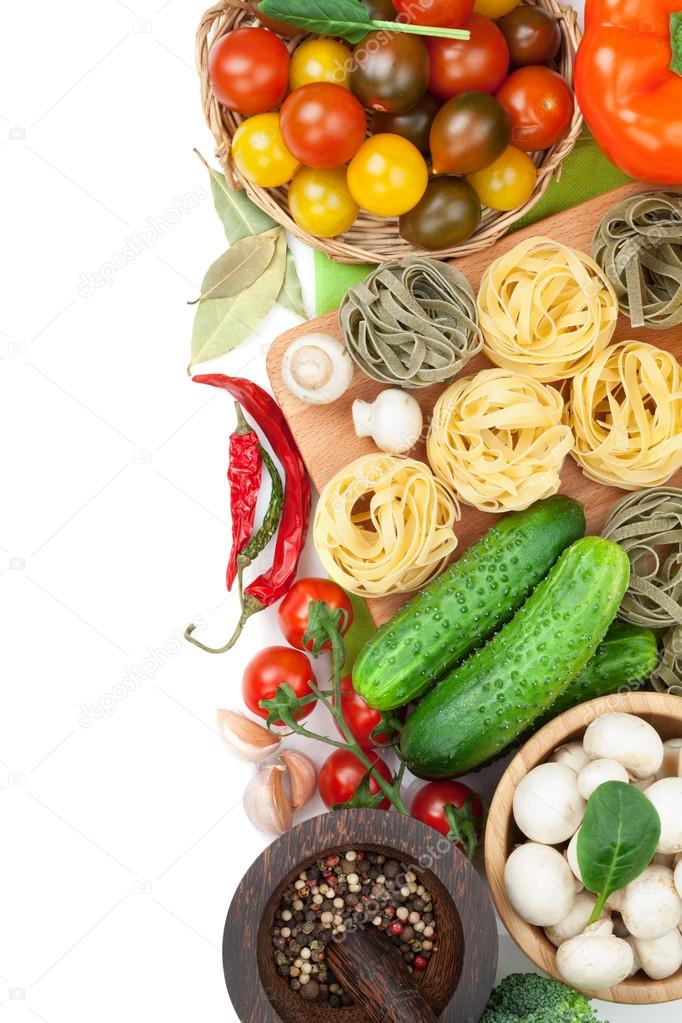 Fresh ingredients for cooking: pasta, tomato, cucumber, mushroom