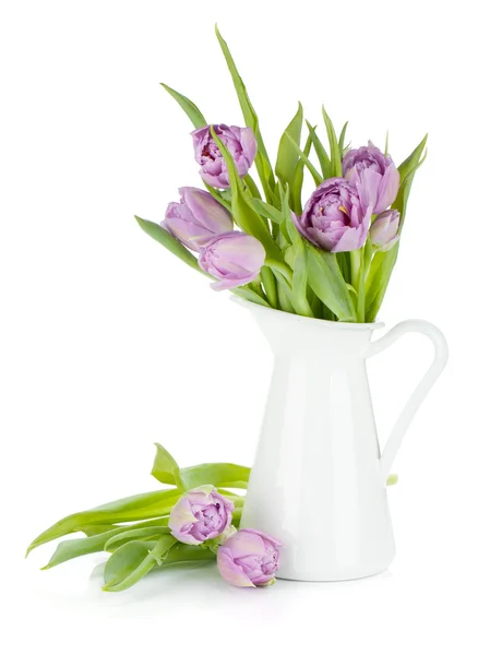 Pink tulips bouquet in pitcher — Stock Photo, Image