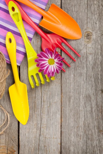 Garden tools with flower — Stock Photo, Image