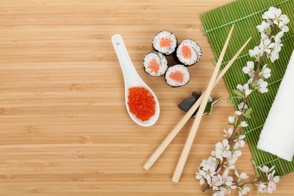 Sushi set, caviar and fresh sakura branch — Stock Photo, Image