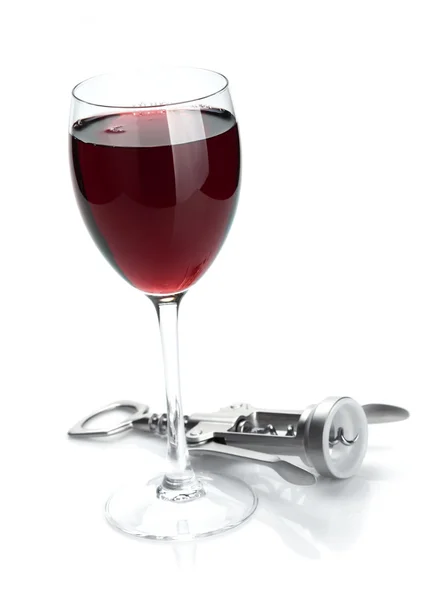 Rött vin glas och corkscrew — Stockfoto