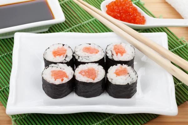 Sushi set, chopsticks, red caviar and soy sauce — Stock Photo, Image