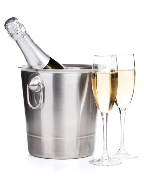 Champagne bottle in bucket and two glasses — Stock Photo, Image