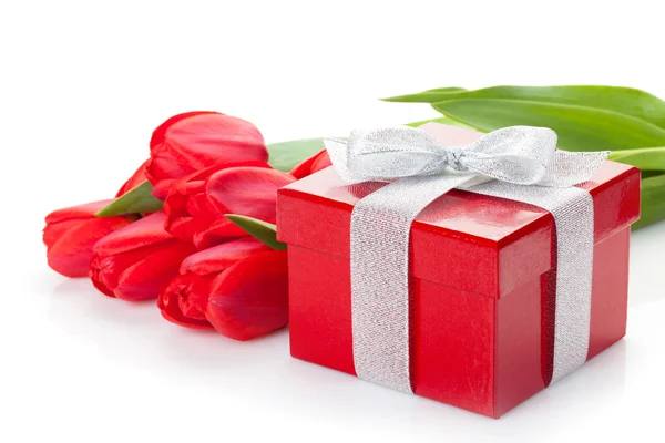 Fresh red tulips with gift box — Stock Photo, Image