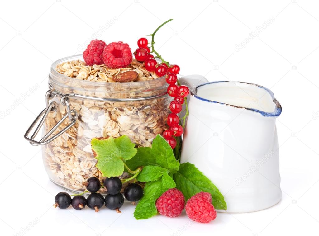 Healty breakfast with muesli, berries and milk