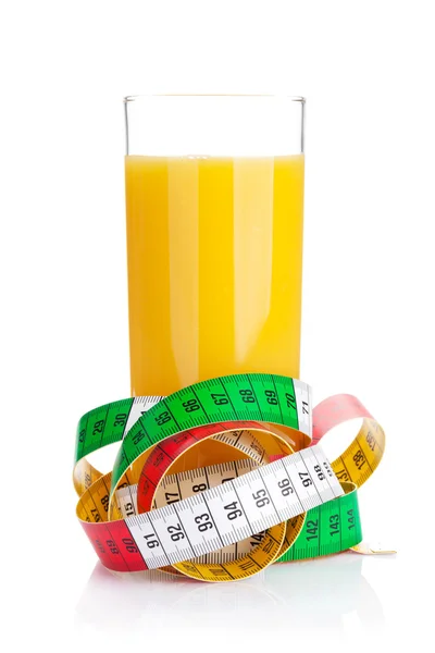 橙汁和测量带. — 图库照片