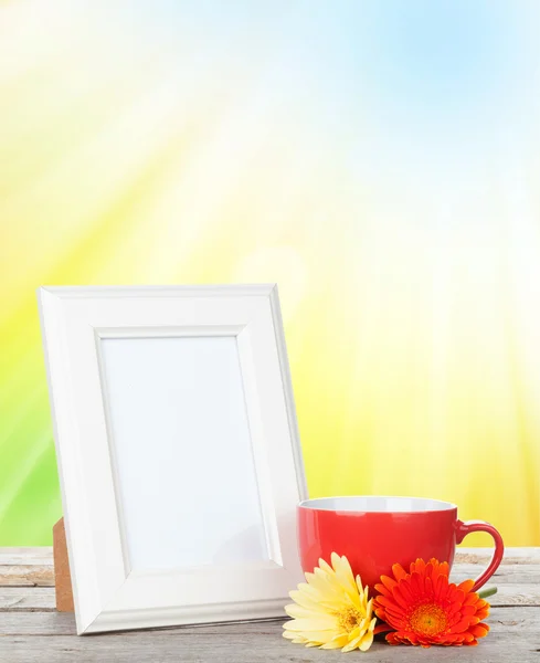 Photo frame with cup — Stock Photo, Image