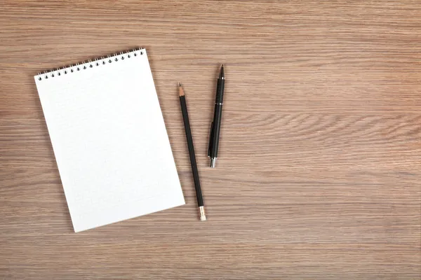 Notepad with pen and pencil — Stock Photo, Image