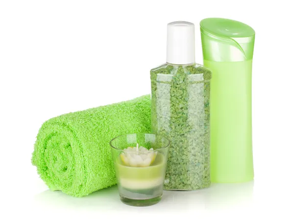 Bathroom bottles, towel and candle — Stock Photo, Image