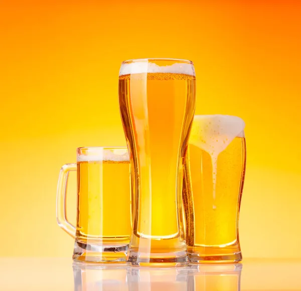 Three Glasses Lager Beer Front Yellow Background Studio Shot — Stock Photo, Image