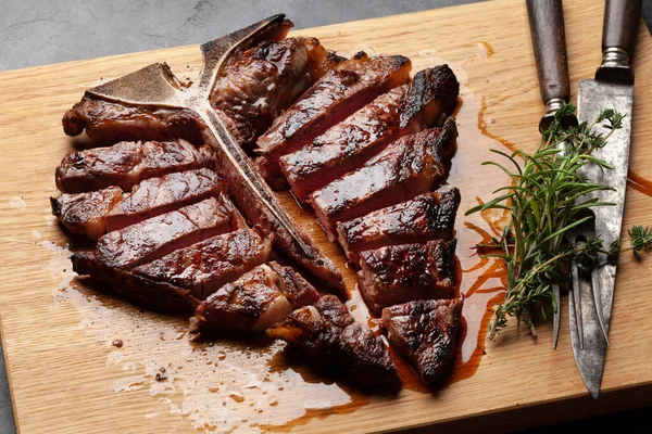 Grilled Porterhouse Beef Steak Sliced Bone Herbs Spices — Fotografia de Stock