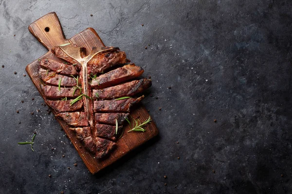 Grilled Porterhouse Beef Steak Sliced Bone Herbs Spices Top View — Foto Stock