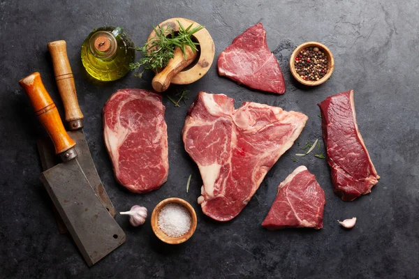 Various Raw Beef Steaks Herbs Spices Top View Flat Lay — Stockfoto