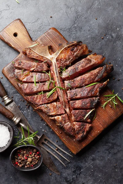 Grilled Porterhouse Beef Steak Sliced Bone Herbs Spices Top View — Stock Photo, Image