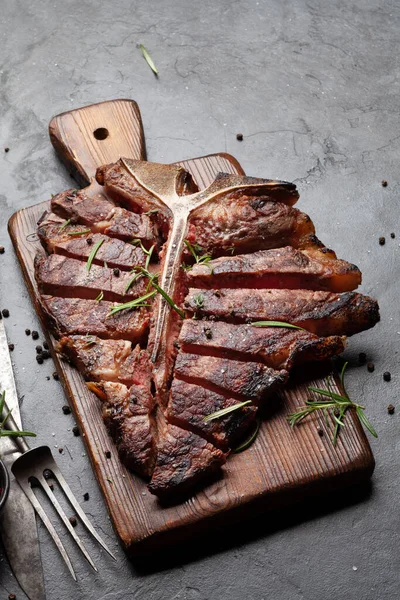 Grilled Porterhouse Beef Steak Sliced Bone Herbs Spices — Zdjęcie stockowe