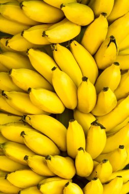 Bunch of ripe bananas background clipart
