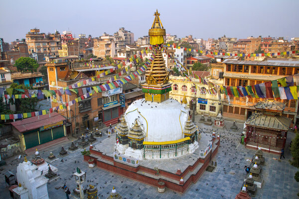 Kathesimbu Stupa with Buddha wisdom eyes and prayer colorful flags in Kathmandu, Nepal