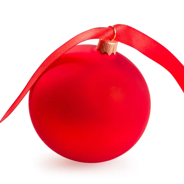 Christmas ball with a red ribbon isolated on white — Stock Photo, Image