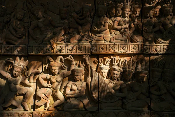 Ancient terrakotta carvings of dancers and musicians — Stock Photo, Image
