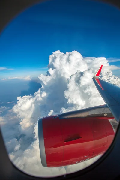 Sky and clouds view from an aircraft window — Stock Photo, Image