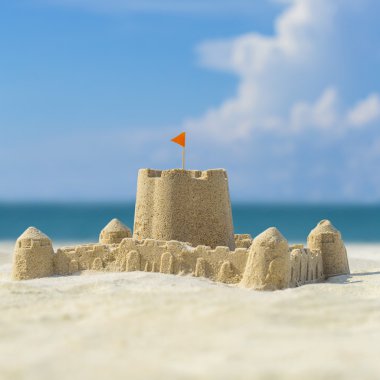 Sand castle on  beach clipart