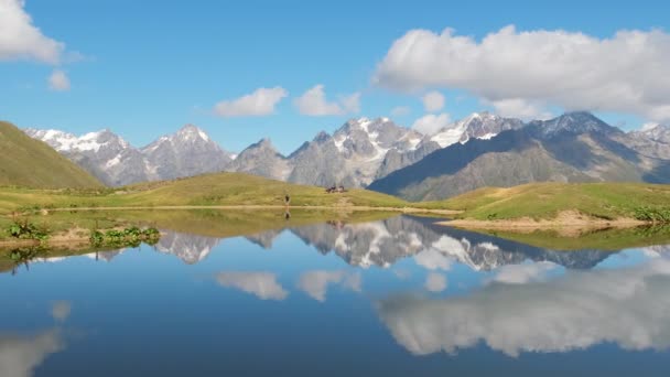 Caucasus mountains reflecting in calm water of Koruldi lakes in Svaneti, Georgia — Stock videók